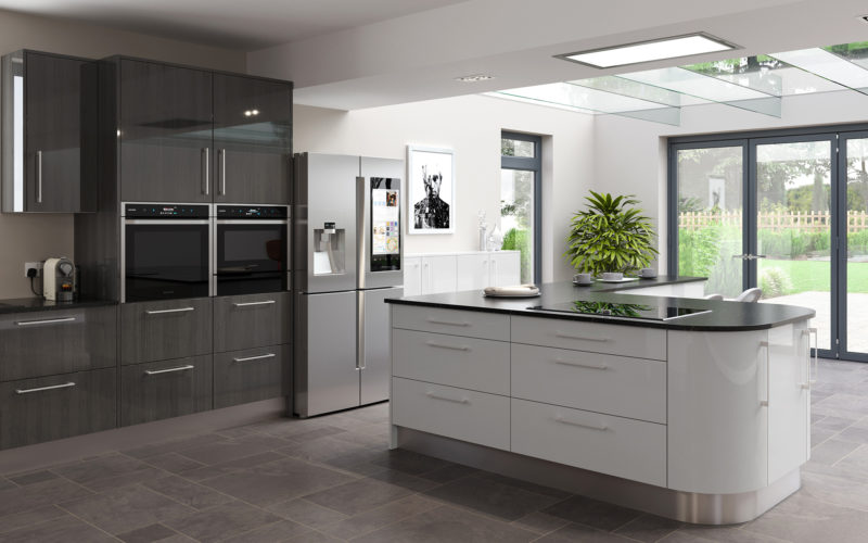 A modern kitchen with both white and slate grey cabinetry, a curved central island, double fridge and double doors