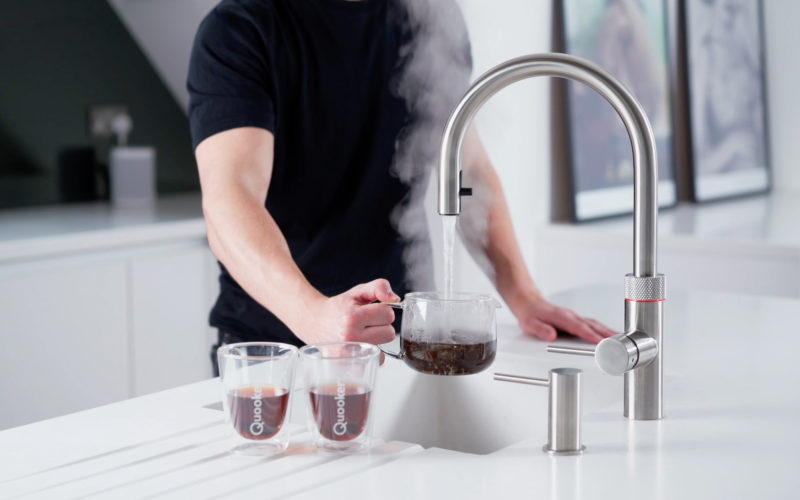 Quooker hot tap showing boiling water coming straight from the tap into a teapot