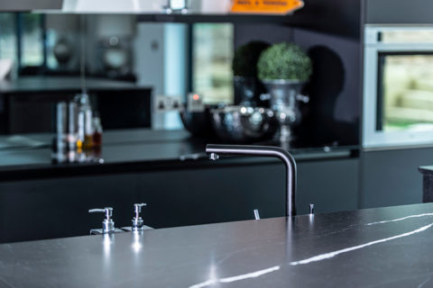 Close up of a black tap in the new kitchen in Woodbridge