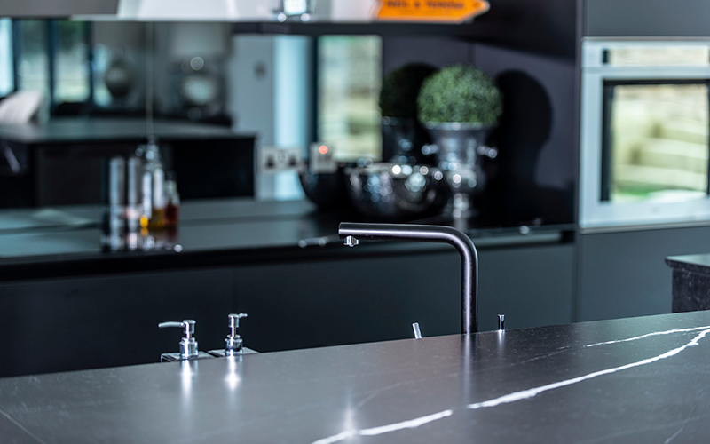 Close up of a black tap in the new kitchen in Woodbridge