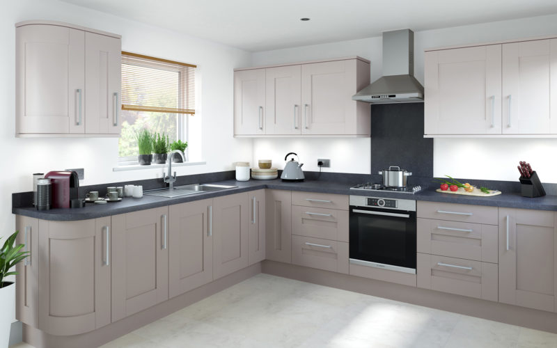Tan grey coloured kitchen with shaker style doors. Dark grey counter tops.