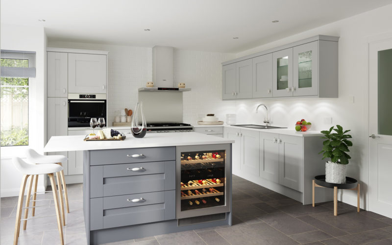 Modern light and dark grey kitchen. Showcasing the kitchen island which has an integrated drinks fridge. All of the counter tops are in white.