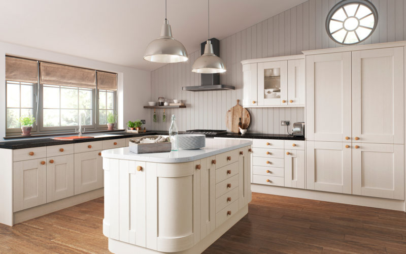 Classic cream kitchen with matching island. The unit around the walls have a black countertop but the island has a textured white counter top. All cabinets have a shaker style door.