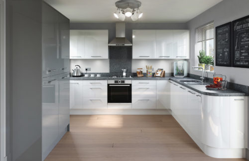 White gloss kitchen cupboards with a textured dark grey countertop.