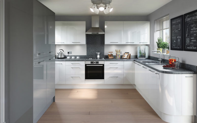White gloss kitchen cupboards with a textured dark grey countertop.