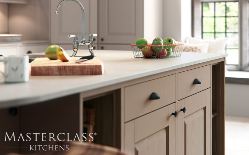 Close up of a kitchen island, showcasing the counter top and cupboards.