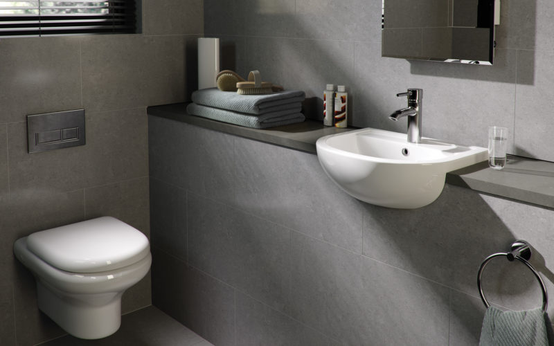 Modern grey bathroom with white toilet and sink