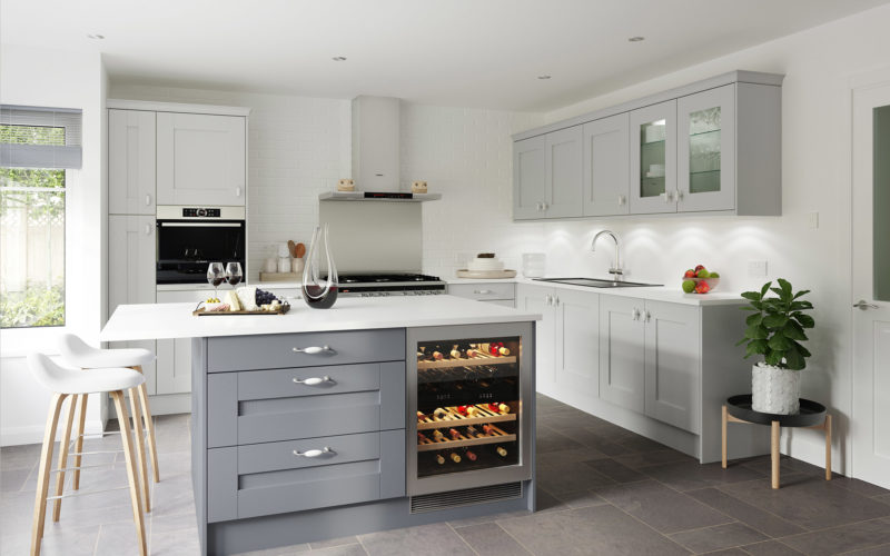 Modern light and dark grey kitchen. Showcasing the kitchen island which has an integrated drinks fridge. All of the counter tops are in white.