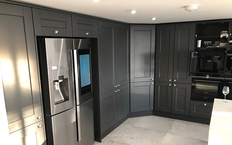 Bespoke cupboards with built in fridge for a new kitchen in Ipswich